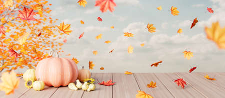 Autumn seasonal background with falling leaves and pumpkins on wooden plank 3d render 3d illustrationの写真素材