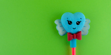 Cute heart on a pencil. Valentine's day background