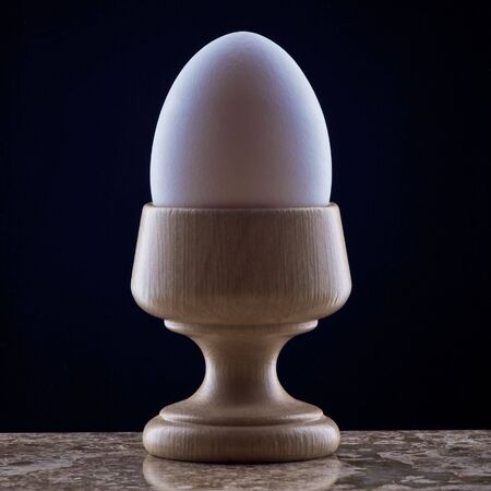Egg in Wooden Cup