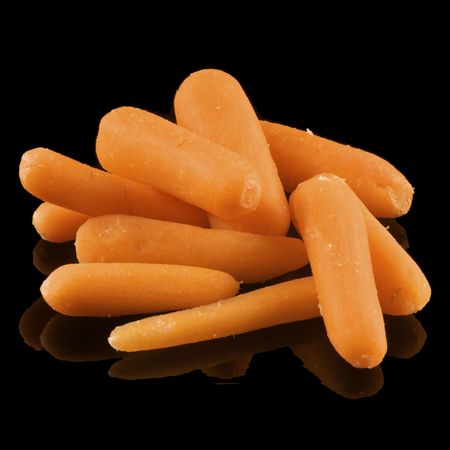 Fresh Organic Mini Carrots on Blackの写真素材