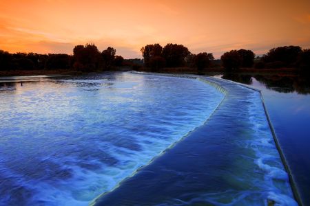 Wilkes Dam Stretches across the Grand River in Brantford, Ontario, Canadaの写真素材