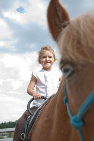 kids ridingの写真素材