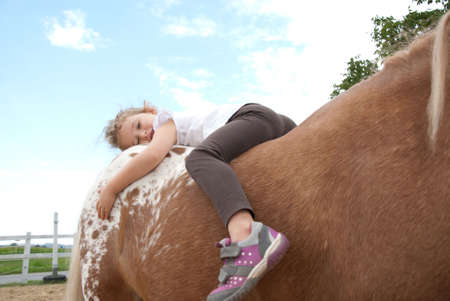 kids ridingの写真素材