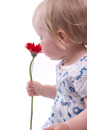 Child gives her mother flowers for Mothers Dayの写真素材