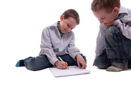 Children have fun while learning and readingの写真素材