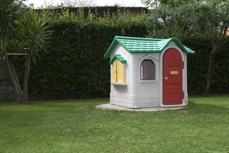 Toy house in the gardenの写真素材
