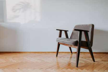Retro gray armchair in modern desing interior