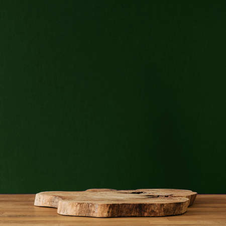 Wooden slice on wooden table and copy spaceの写真素材