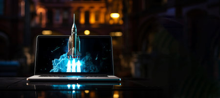 Rocket takes off from the laptop screen. Concept of innovation and development with copy spaceの素材