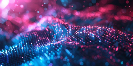 A blue and pink background with a lot of dots. The dots are in different sizes and colorsの素材