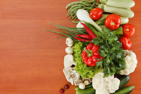 Healthy food - Fruits and vegetables on the kitchen table much space for own text