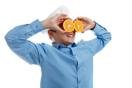 Portrait of teen Cook like binoculars. Isolated on white background.の写真素材