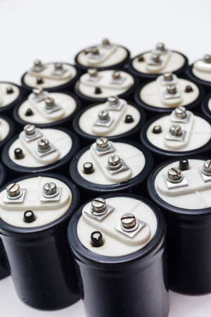 Collection Electrolytic capacitor with two black Clem plus and minus. Isolated on white backgroundの写真素材