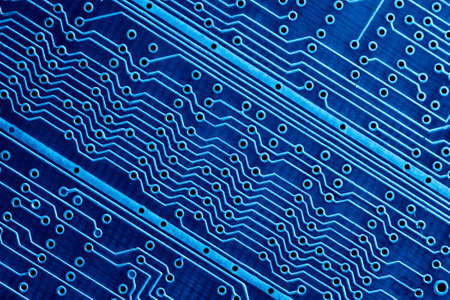 Blue Computer circuit board close up for background.