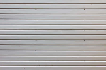 Profiled metal shiny background with horizontal stripes