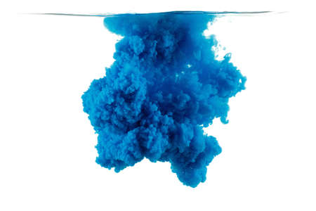 Color drop in water, photographed in motion. Ink swirling in water. Cloud of ink in water isolated...