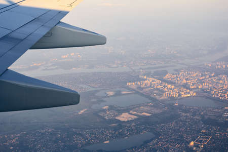 Unusual view of sky and clouds from a plane, top viewの写真素材