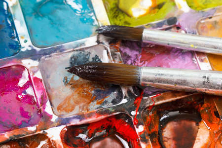 Set of watercolor paints and paintbrushes for paintingの写真素材