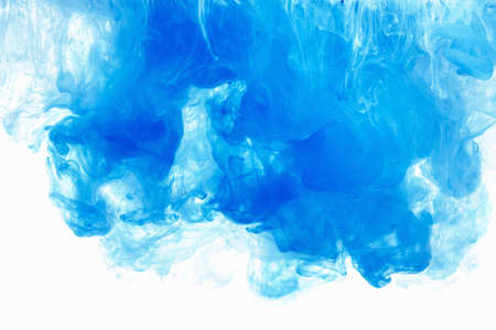 Abstract background color ink drop in water, motion swirling. Blue cloud of paint on white.