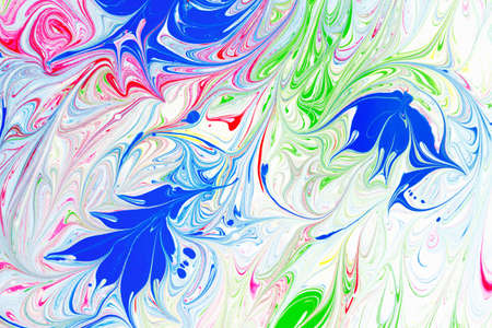 Abstract pattern, Traditional Ebru art. Painting on water, followed by paper prints. Color ink paint with waves. Floral background.の写真素材