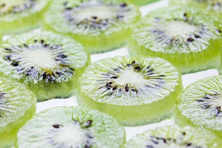 Slices of kiwi fresh fruit on white backgroundの写真素材