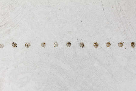 Old aluminum background detail of a military aircraft, surface corrosion. Oxidized metal texture with rivets.の写真素材