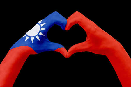 Hands flag of Taiwan, shape a heart. Concept of country symbol, isolated on black. Abstract 3d illustration graphic, design with pattern and texture.の写真素材