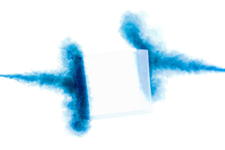 Color paint splash background, liquid blue ink abstract isolated. Smoke abstract template design. Ink swirling drop in water isolated on white background.の写真素材