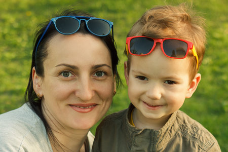 Family having fun mother son summer glasses.