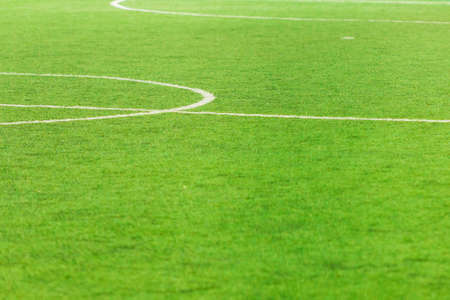 Soccer field, center and sideline. White markings on a green football fieldの写真素材