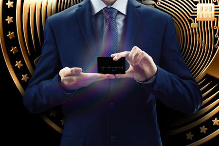 Cryptocurrency and credit card. Business, Finance and technology concept. Bit coin, Ethereum block chain. Businessman. on-line banking and e-commerce.の写真素材
