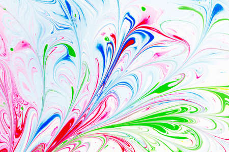 Abstract pattern, Traditional Ebru art. Painting on water, followed by paper prints. Color ink paint with waves. Floral background.の写真素材