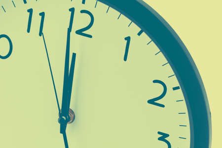Round clock Christmas New year's at midnight hour hand conceptの写真素材