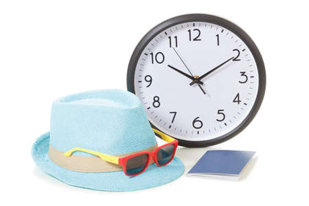 Vacancy concept. Clock, passport and sunglasses on hipster hatの写真素材
