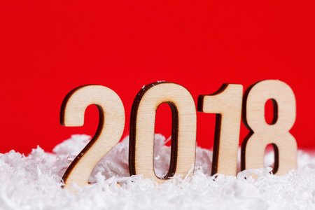 Christmas New year 2018 made with wooden on red background, copy space.の写真素材