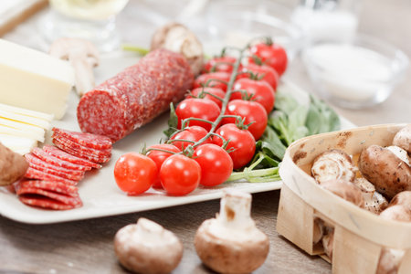 Food ingredients for pizza on table close upの写真素材