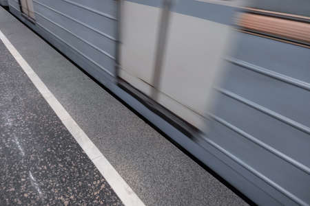 Subway train railcar in motion public rail traffic.の写真素材