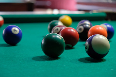 Billiard chelk and pool table background closeup.