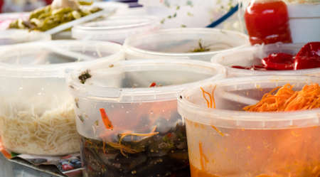 Market stall bazaar offers wide range of spicy and tasty pickles, pepper, tomato, garlic and others.の写真素材