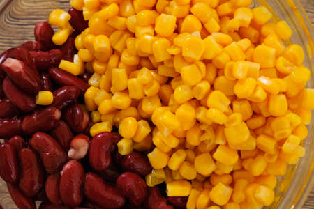 Beans and corn background close up food in bowlの写真素材