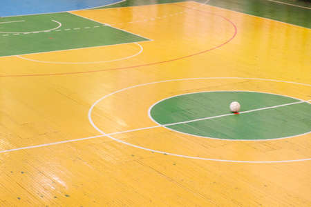 Indoor football or futsal stadium with a bright markup of the playing field and ball in center. Soccer playground. Top View.の写真素材