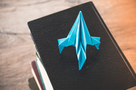 Back to school concept rocket is on books. Idea of knowledge and aspirations in make a career