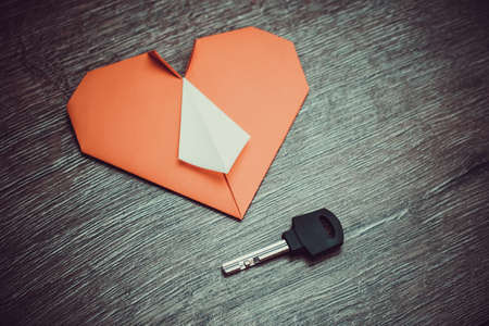 Key to heart symbol of love. Concept dating close upの写真素材