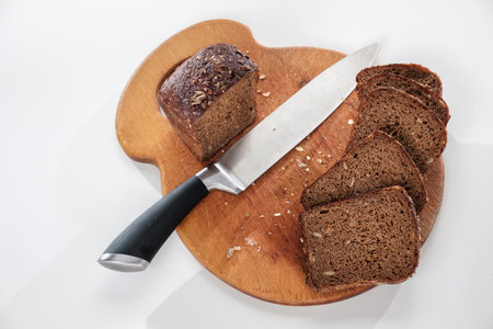 Freshly baked bread isolated on white background, top view