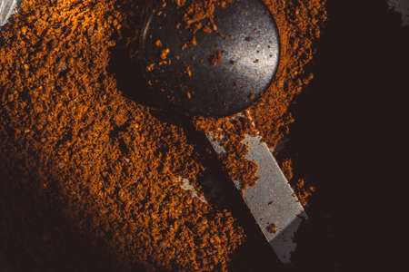 ground aromatic fragrant coffee in grinder texture macro beans backgroundの写真素材