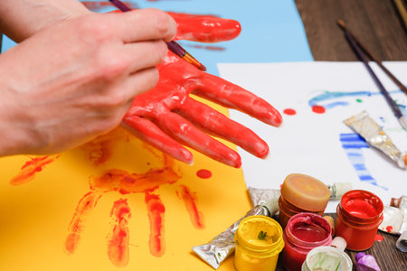 Artist paint brushes on wooden background, handmade craft art processの写真素材