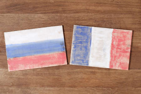 France and Russia flag, concept cooperation friendship competition on wood background. Grunge wallの写真素材