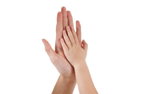Woman and baby playing with hand together isolated on white, love and family gestures conceptの写真素材