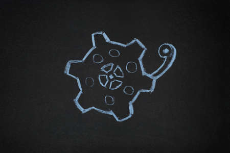 Gear on chalkboard background. Abstract art concept of motionの写真素材