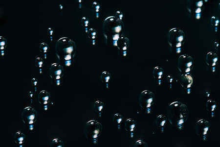 water drops on black abstract background. Macro extreme.の写真素材